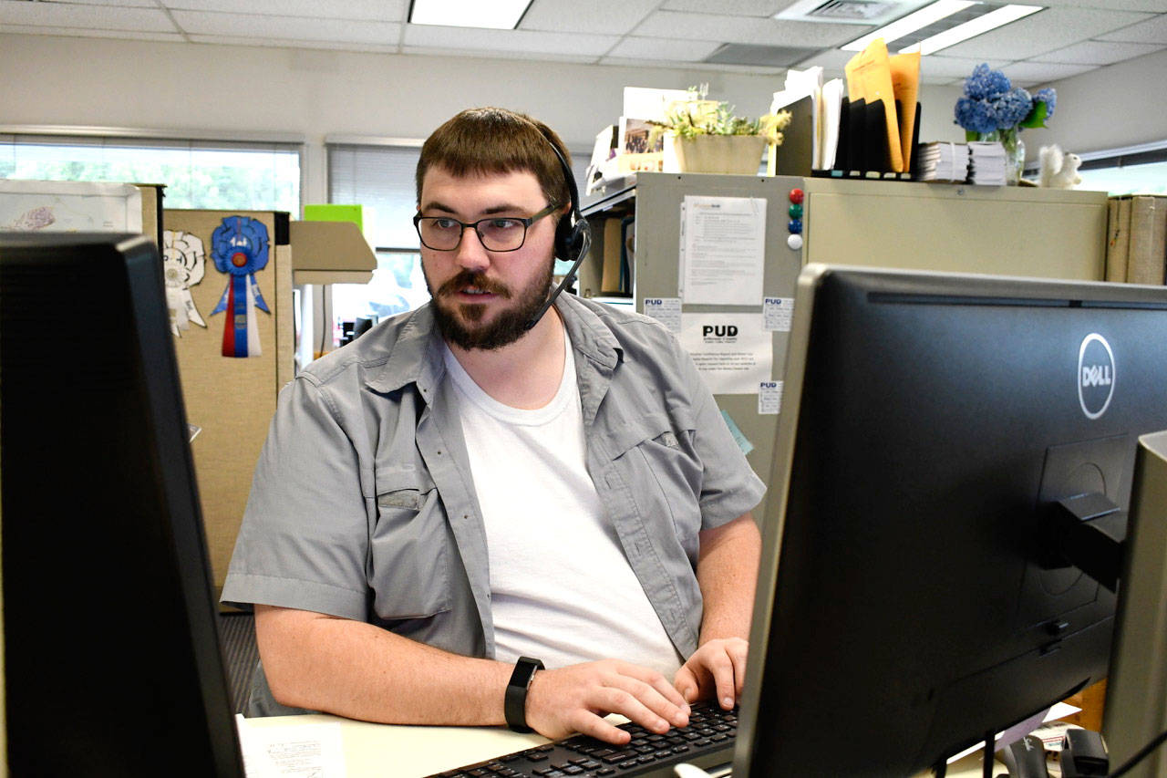 Jefferson County PUD customer service representative Jeff Gordon said the recent rash of scammers typically don’t indicate they are calling from the PUD. Rather they use other acronyms or PSE. (Jeannie McMacken/Peninsula Daily News)