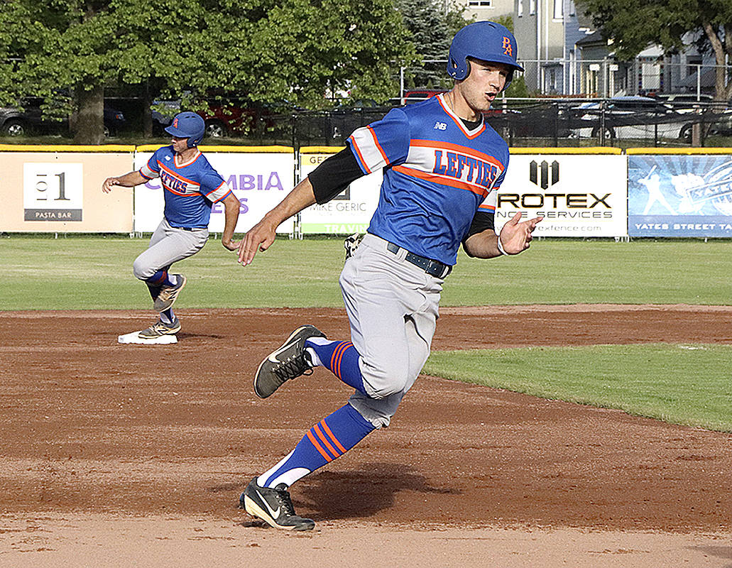 <strong>Don Descoteau</strong>/Black Press                                The Port Angeles Lefties Dalton Harum (front baserunner) was named the player of the week by the West Coast League.