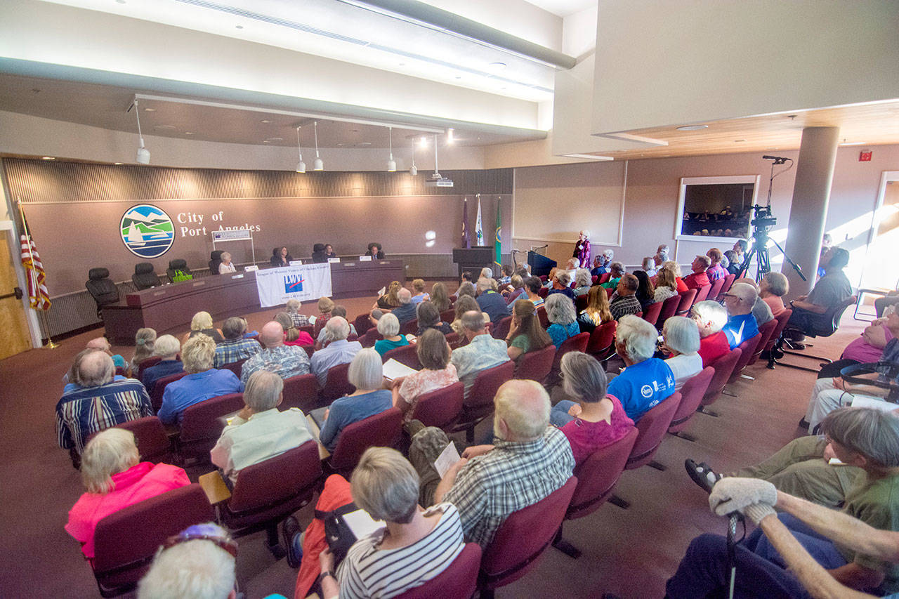 A crowd packs the Port Angeles City Council Chambers for a League of Women Voters forum featuring candidates for Clallam County District Court 1 judge on Monday. (Jesse Major/Peninsula Daily News)