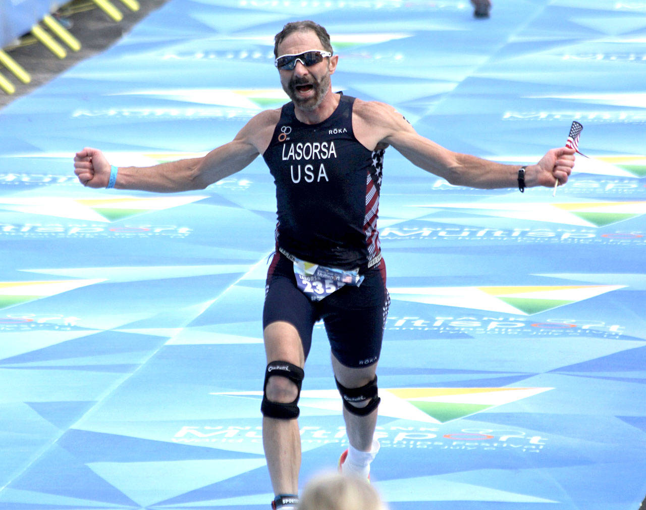 Port Angeles Dave Lasorsa crosses the finish line at the Sprint Duathlon World Championship, held in Odense, Denmark earlier this month. Lasorsa placed 15th in the 60-64 age group at the World Championship.