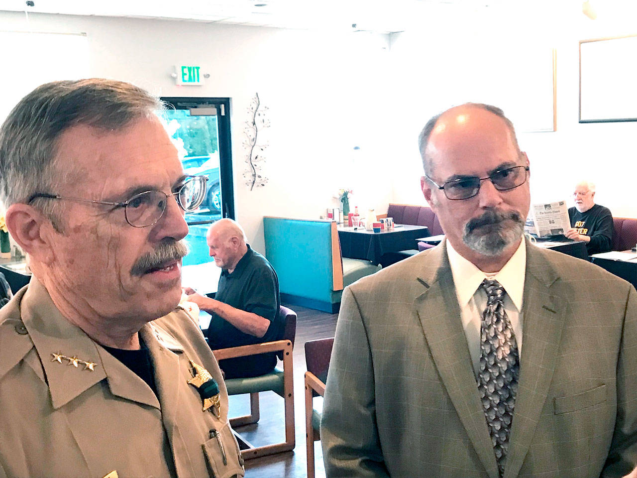Incumbent Clallam County Sheriff Bill Benedict, left, and challenger Jim McLaughlin appeared for their first question-and-answer forum of the election season Tuesday. (Paul Gottlieb/Peninsula Daily News)