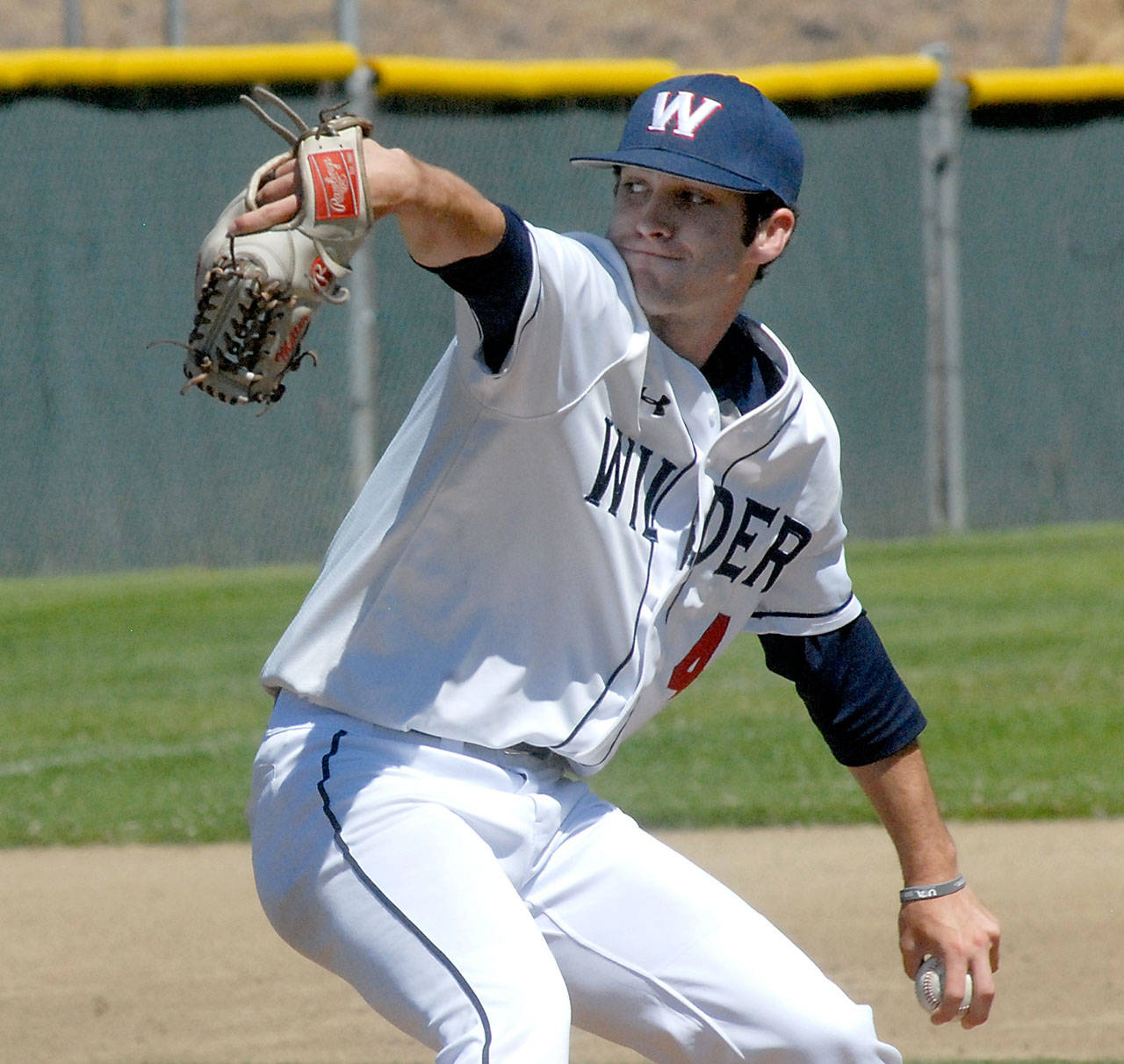 Keith Thorpe/Peninsula Daily News Wilder Senior pitcher Ian Miller throws in a July 14 game against Skagit.