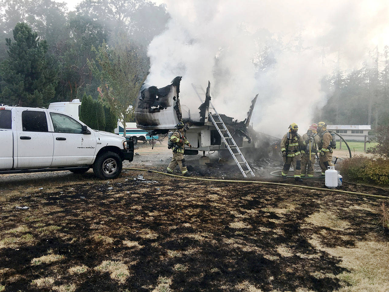 Crews from East Jefferson Fire Rescue were among those responding to a fatal early morning fire Saturday on Marrowstone Island. (Bill Beezley/EJFR)
