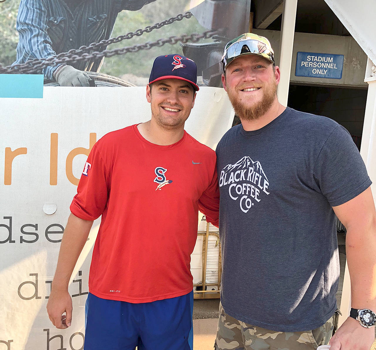 Cole Uvila, left, and Easton Napiontek, members of the Port Angeles High School Class of 2012, held a mini-reunion before Uvila and his Spokane Indians faced the Boise Hawks. The friends and former Roughriders teammates were each drafted by the Texas Rangers, Uvila last June and Napiontek in 2013. Uvila has a 1-0 record with a 1.61 ERA and two saves in 13 appearances for Class-A Spokane this summer.