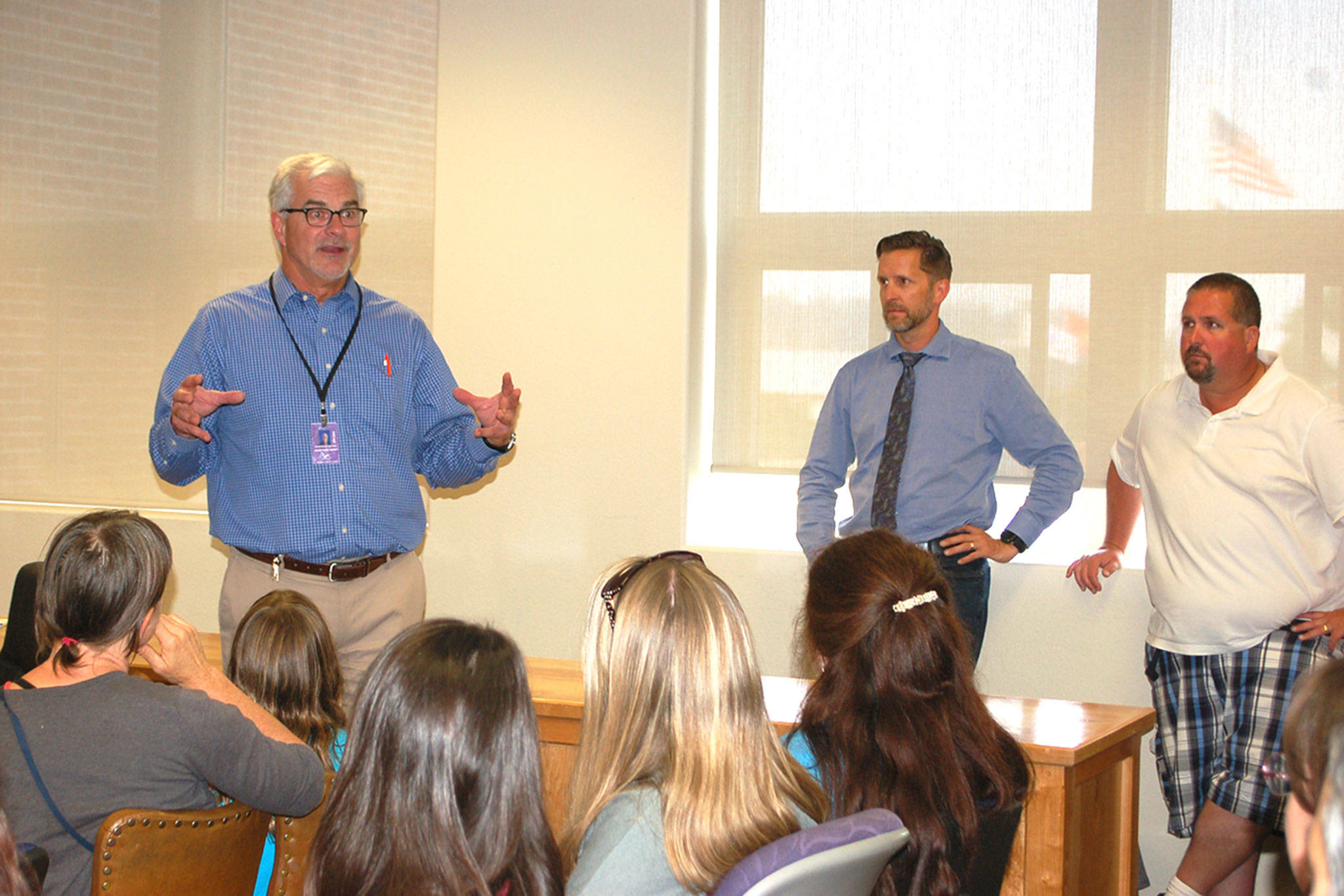 Sequim Schools Superintendent Gary Neal discusses temporary housing for the Olympic Peninsula Academy with the alternative education programs Parent Teacher Organization, parents and staff. (Erin Hawkins/Olympic Peninsula News Group)
