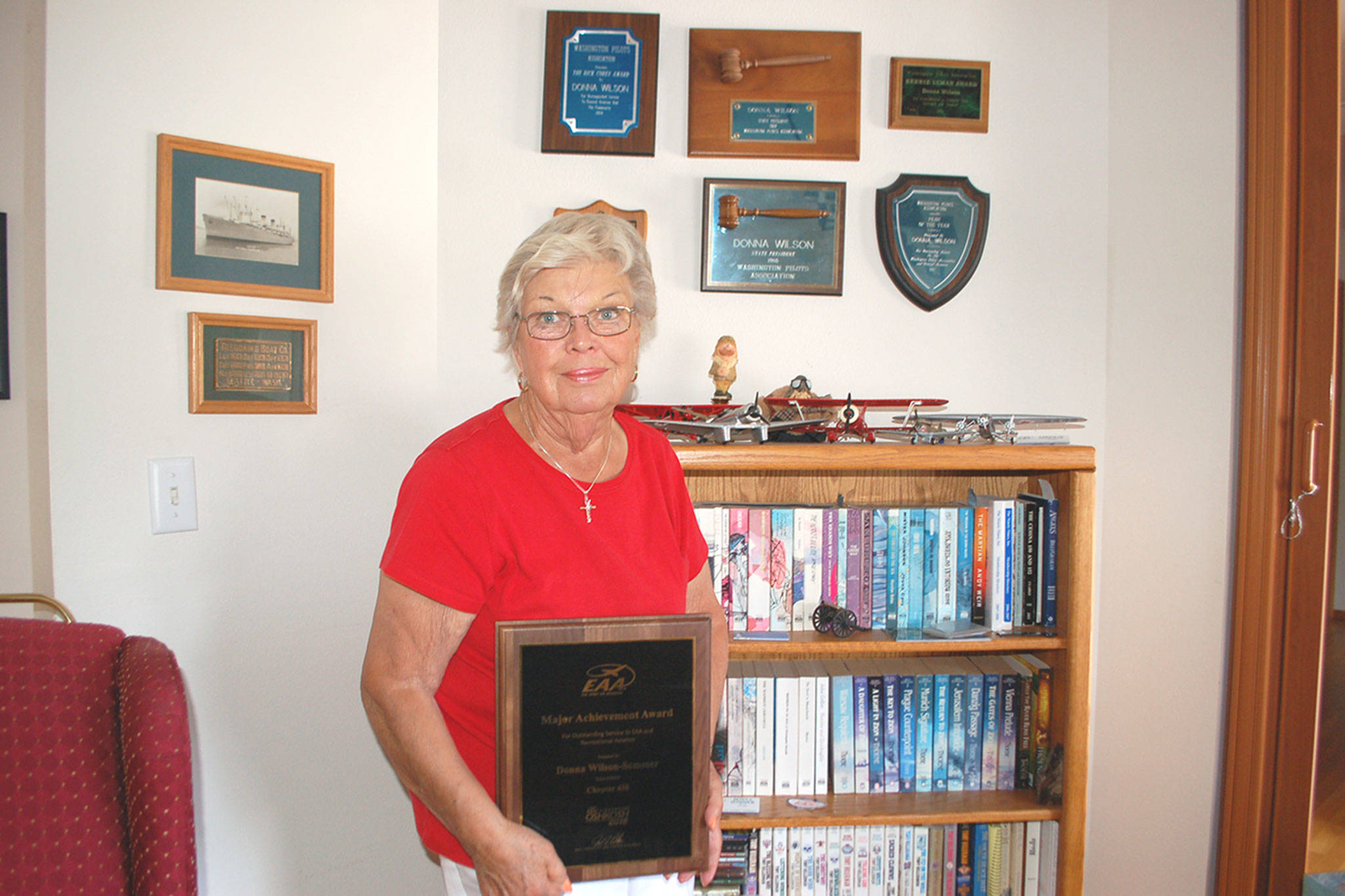Among a handful of other aviation awards that hang on the walls of her home, Sequims Donna Wilson-Sommer is the Experimental Aircraft Association 2018 Major Achievement Award Winner for her many years of promoting aviation in her local communities. (Erin Hawkins/Olympic Peninsula News Group)