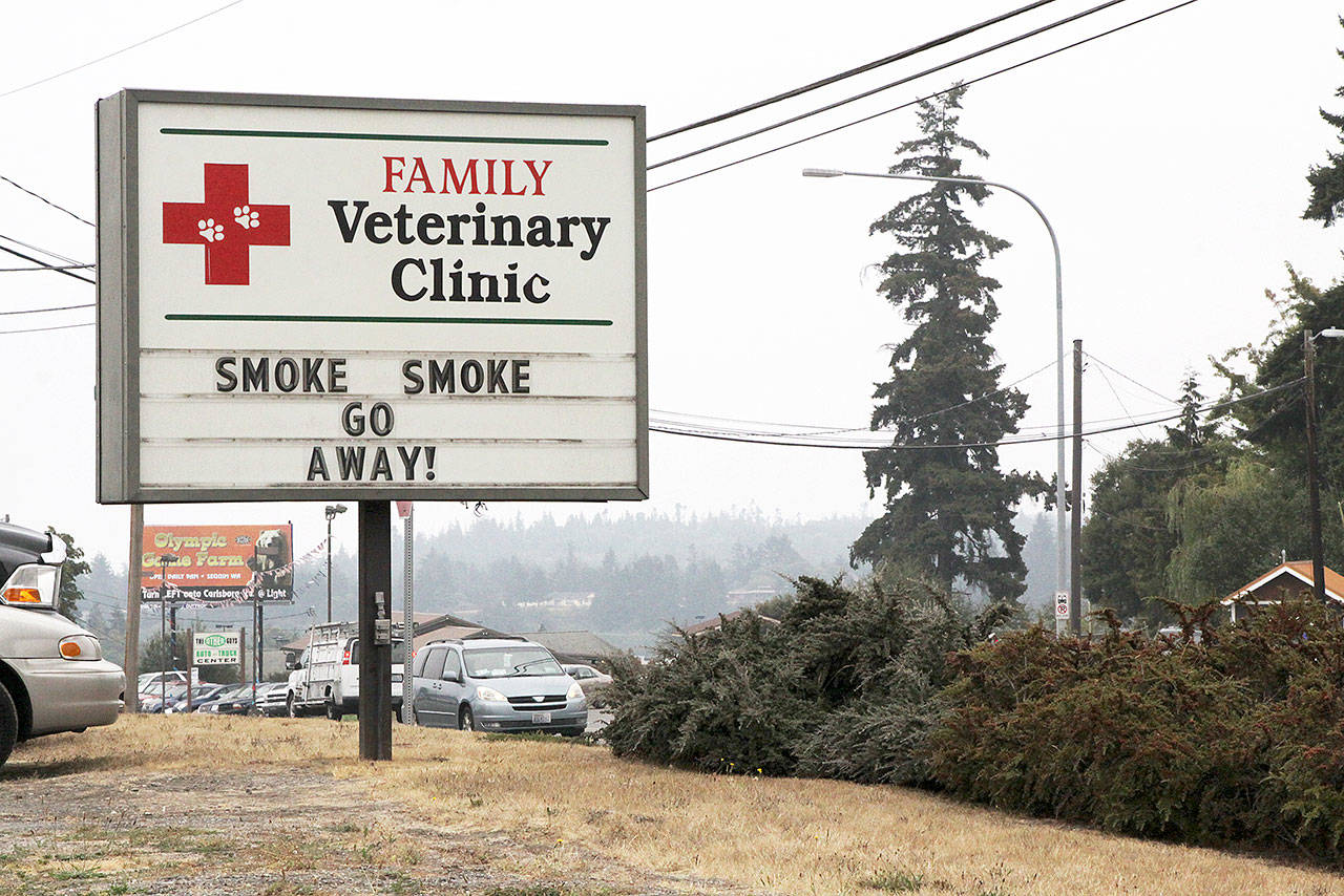 Smoke lingers in the air, and on the nerves, of North Olympic Peninsula residents. (Dave Logan/for Peninsula Daily News)