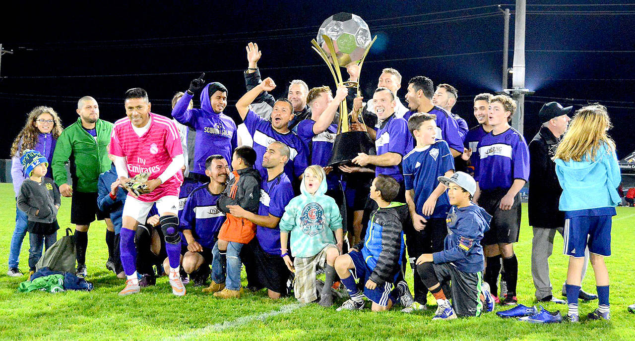 Sequim celebrates winning the Super Cup with a victory over Port Angeles last year.