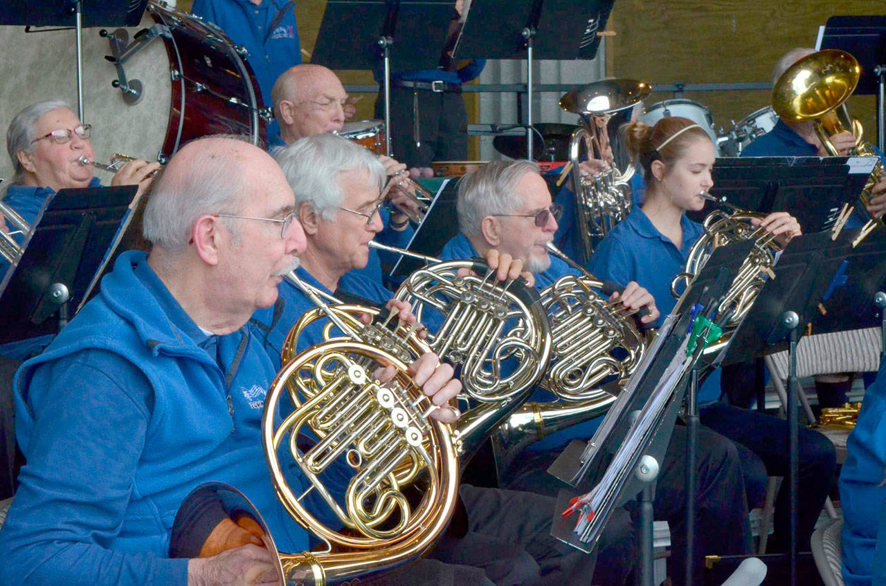 The horn section of the Sequim City Band is pictured in this file photo.