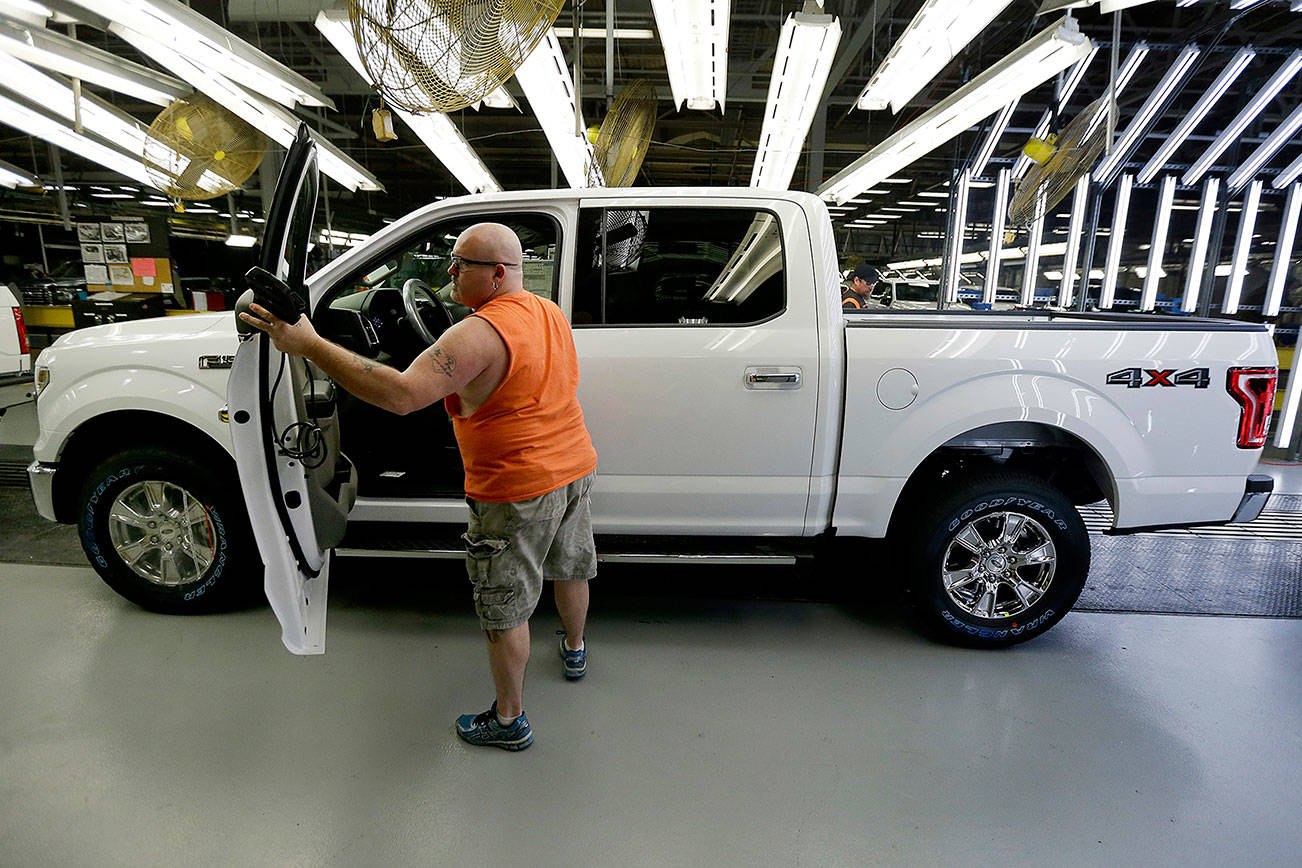 Ford recalls 2M trucks; seat belts can cause fires