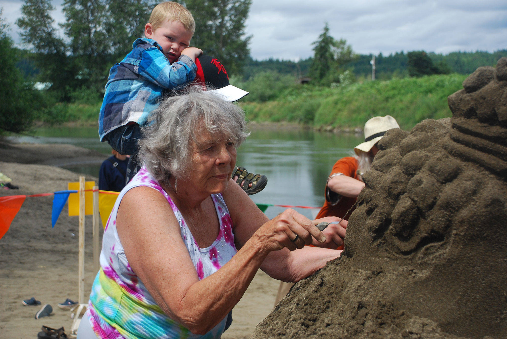 Local artist Kali Bradford plans to create an 8-foot sand sculpture for the Reach and Row and Waterfront Day event Saturday at John Wayne Marina.