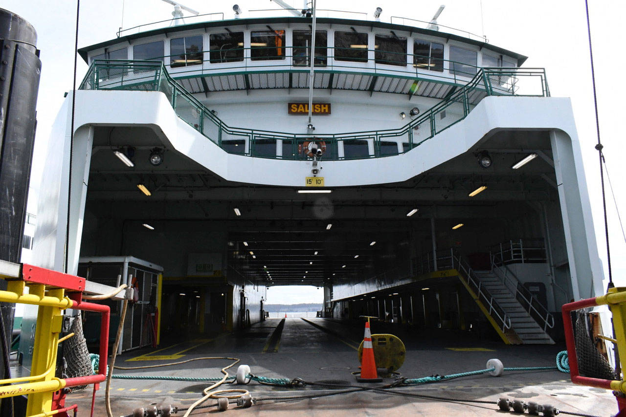 The MV Salish waits for a tow to dry dock after being damaged during a grounding incident in Keystone Harbor at Coupeville on Sunday. (Jeannie McMacken/Peninsula Daily News)