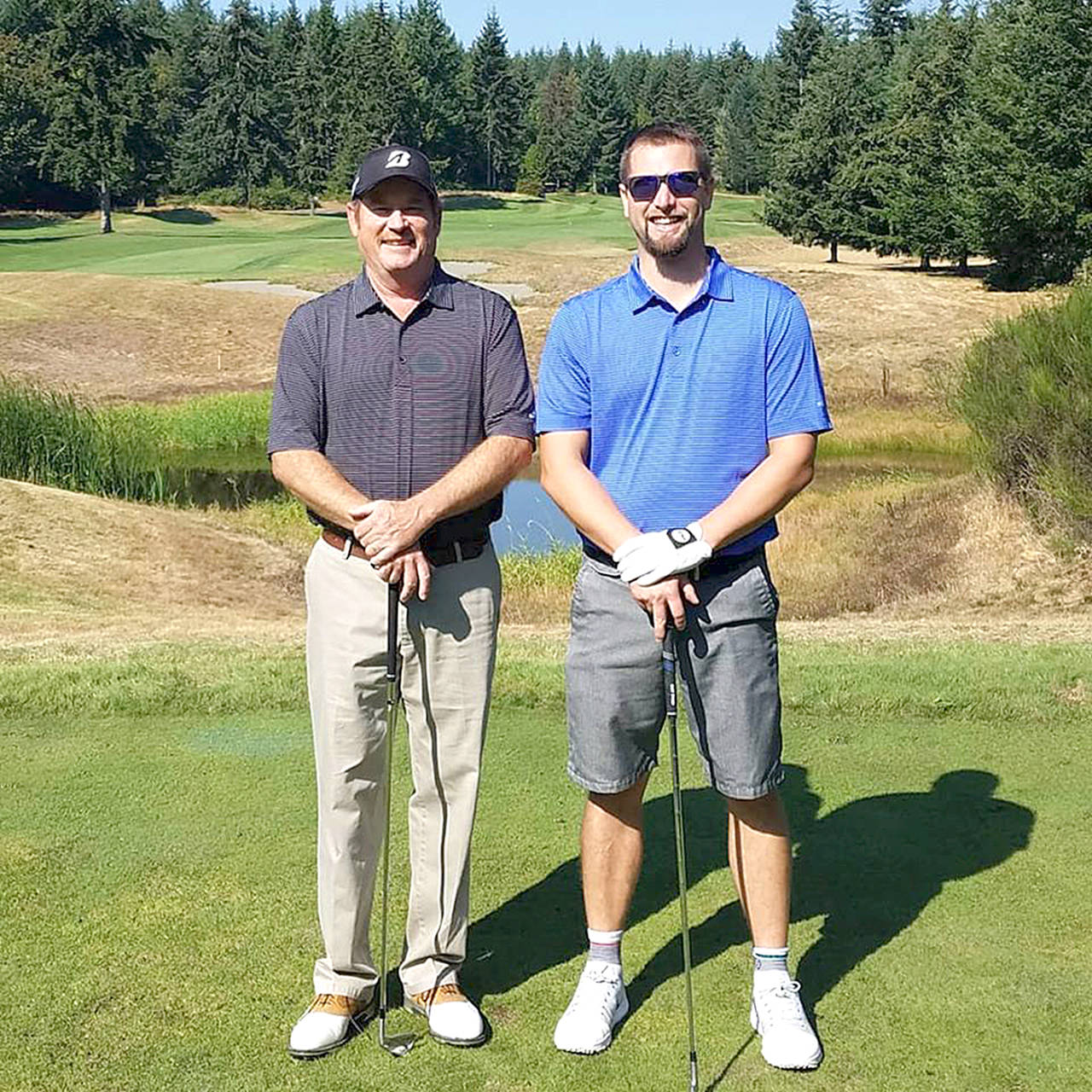 Western Washington PGA Peninsula                                Golf Club head pro Chad Wagner, right, partnered with Twin Lakes Golf & Country Club’s Joshua Scothorne to win two matches for the victorious South team at the Western Washington PGA’s 33rd annual Cutter & Buck North/South Cup.