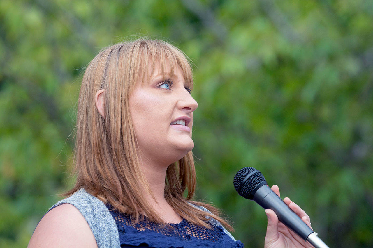 During the World Suicide Prevention Day event in Port Angeles on Monday evening, Reagan Mead fights back tears as she describes attempting suicide when she was 16. (Jesse Major/Peninsula Daily News)