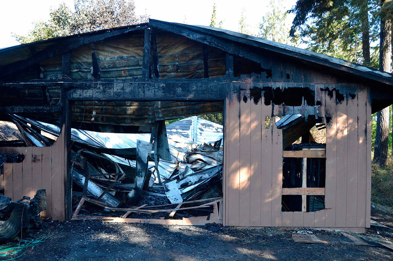 Staff with the Cedars at Dungeness estimate about 50 golf carts and other equipment were lost on Sunday, Sept. 16 in an early morning fire. No injuries were reported and the cause remains under investigation. (Matthew Nash/Olympic Peninsula News Group)
