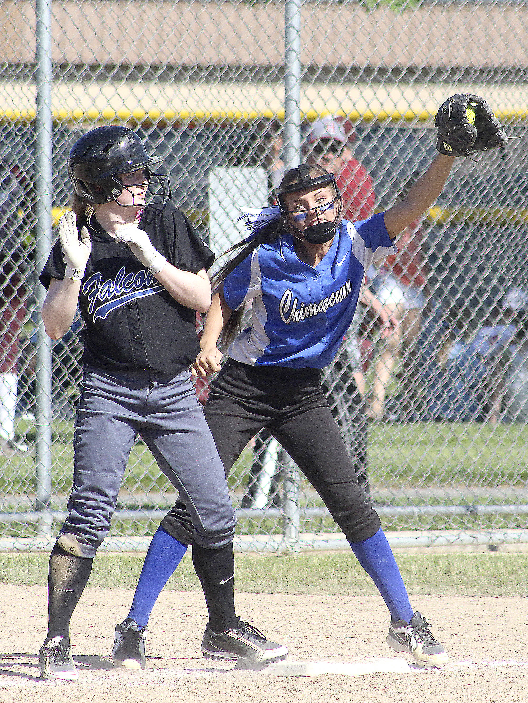 &lt;strong&gt;Roger Harnack&lt;/strong&gt;/Daily Sun News                                 Chimacum’s Taylor Carthum holds a South Whidbey base runner at third base during the Class 1A state softball tournament in 2017.