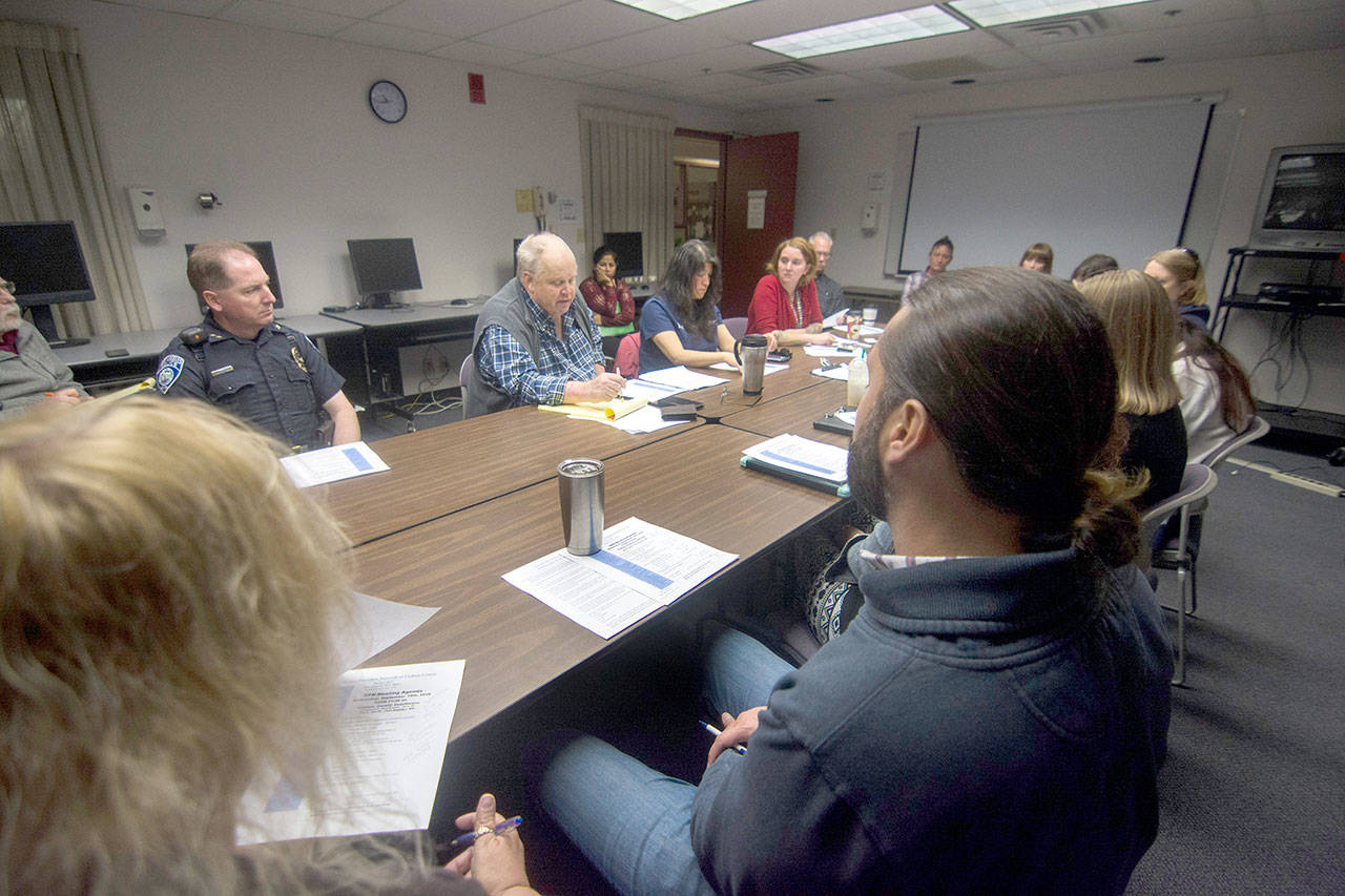 The Shelter Provider Network meets at the Clallam County Courthouse on Wednesday. Doc Robinson, director of Serenity House, told the board that Serenity House is hiring a shelter director in anticipation of re-opening its night-by-night shelter next month. (Jesse Major/Peninsula Daily News)