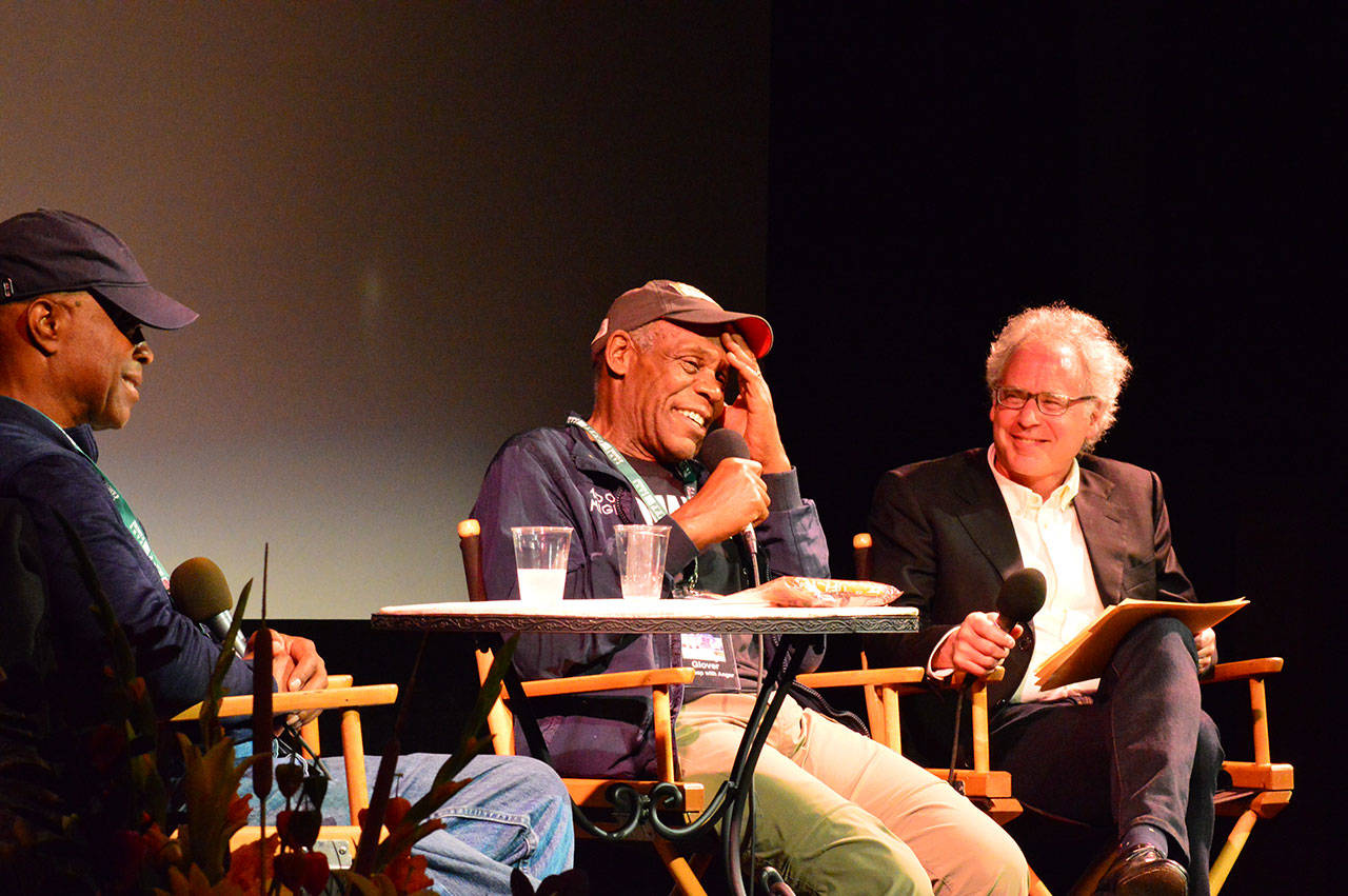 Rocky Friedman, right, interviews Danny Glover, center, and director Charles Burnett at the American Legion on Friday night. Burnett and Glover are guests of this weekend’s Port Townsend Film Festival. (Diane Urbani de la Paz/for Peninsula Daily News)
