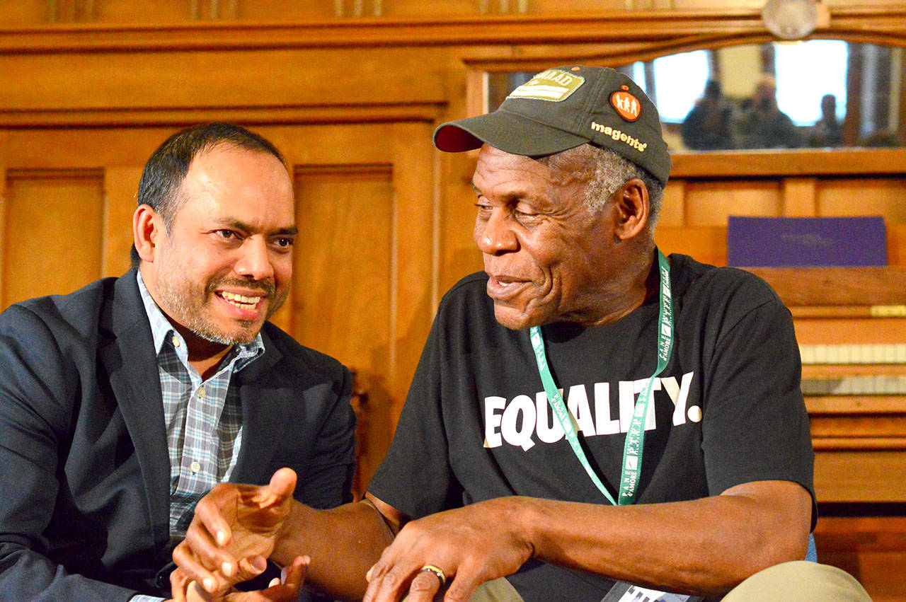 Rais Bhuiyan of WorldwithoutHate.org, left, and Danny Glover engaged in a discussion Friday afternoon during a free Port Townsend Film Festival program at the First Presbyterian Church. (Diane Urbani de la Paz/for Peninsula Daily News)