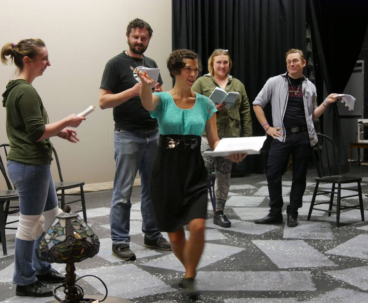 Director Tia Stephens, center, works with the cast of “Sylvia” — from left, Melissa Karapostoles, Edwin J. Anderson III, Jennifer Horton and Michael Sickles — at a recent rehearsal. (Olympic Theatre Arts)
