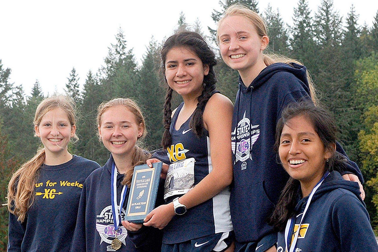 PREP ROUNDUP: Forks girls win Toutle Lake XC race; PT’s Cantrell wins at Twilight