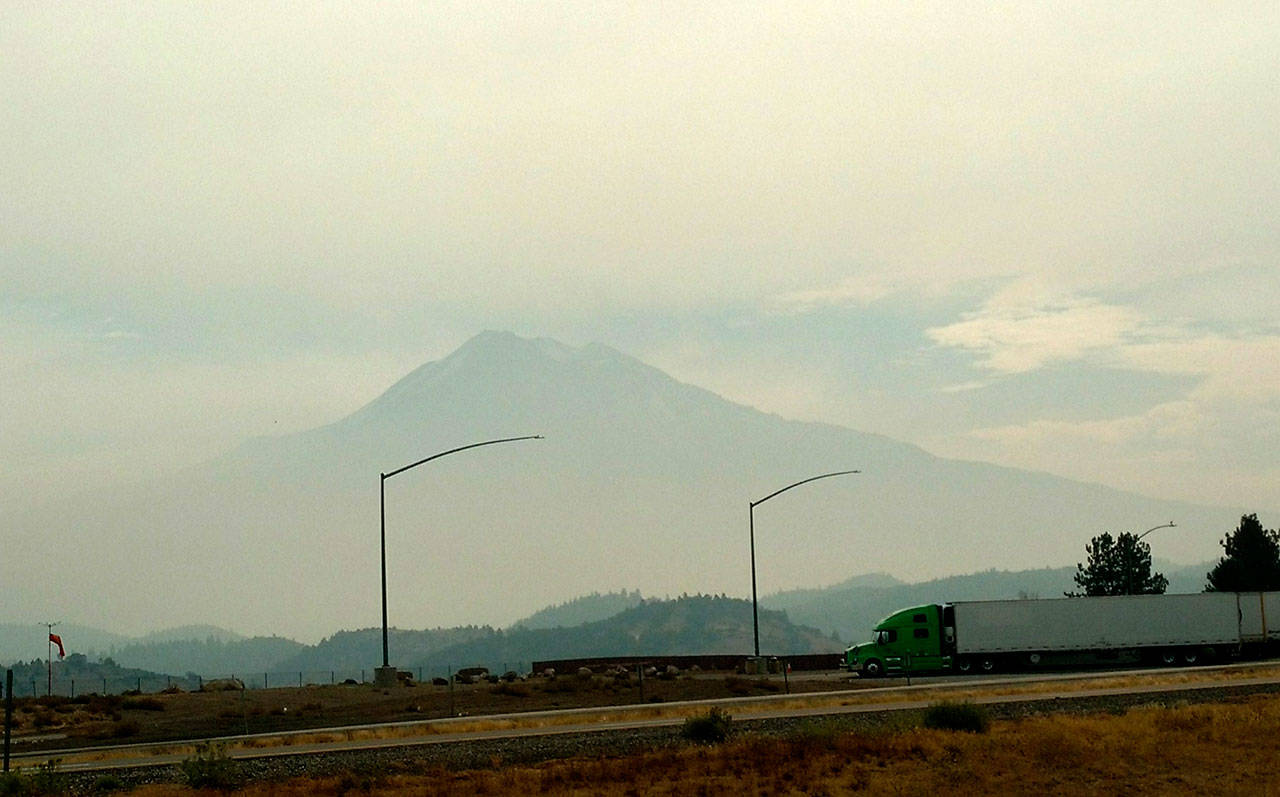 Mount Shasta is barely visible through the thick smoke of wildfires in southern Oregon and northern California on Sept. 6. (Zorina Barker/for Peninsula Daily News)