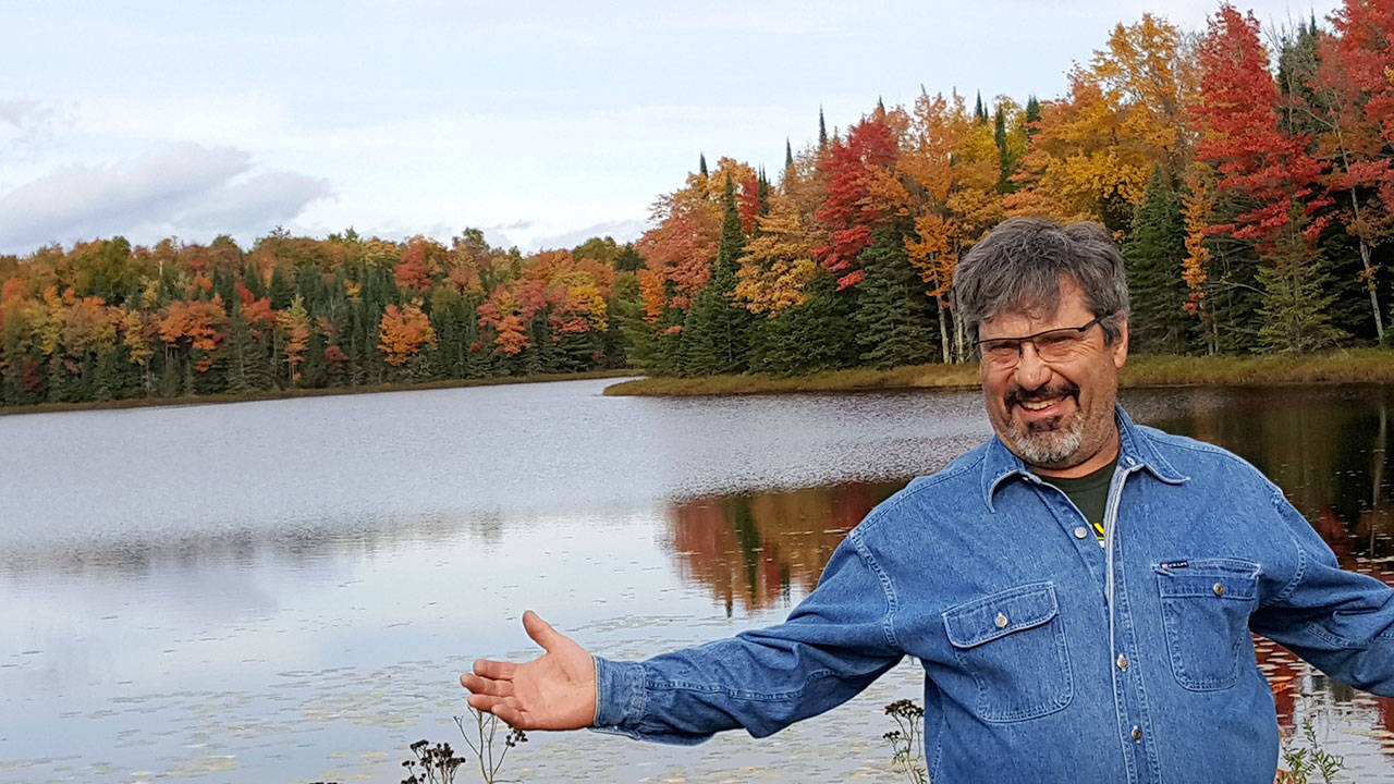 Andrew May enjoys the folliage of northern Wisconsin’s Vilas County, where May and his sister, Linda, now own a family cottage.