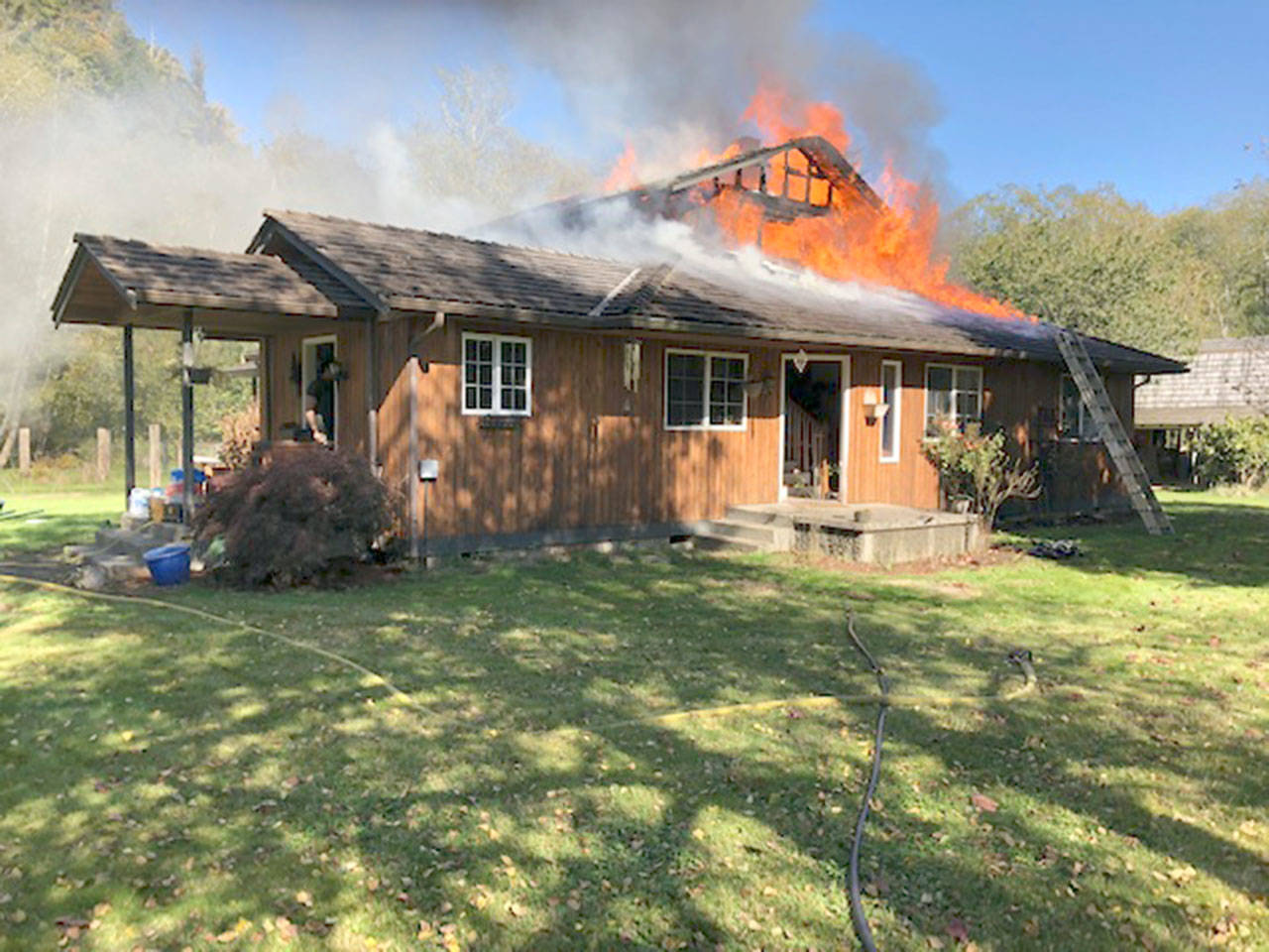 The cedar home of Clallam Bay High School basketball Coach Kelly Gregory was destroyed by fire late Thursday night. (Clallam County Fire District 5)