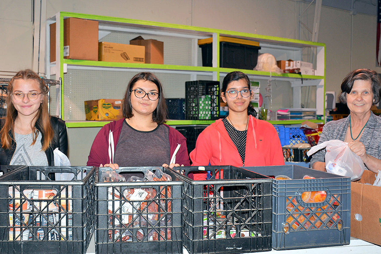 Exchange students help with Port Angeles food program