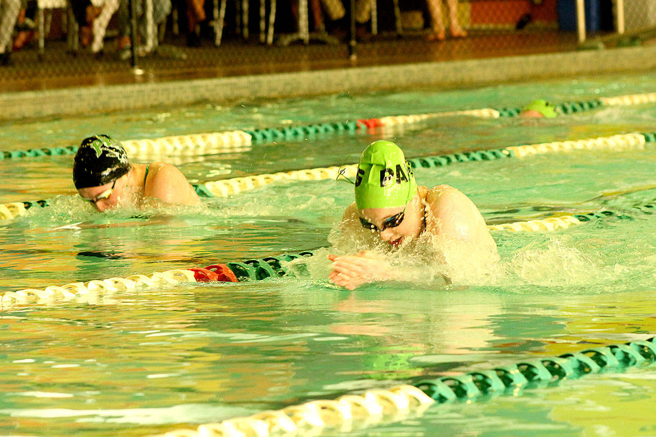Nadia Cole swimming the breaststroke in Tuesday’s meet against Peninsula. Cole took first in the event. (Patty Reifenstahl)