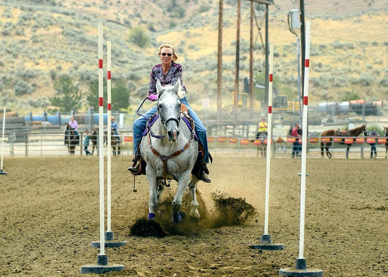 Waynora Martin and her horse, A Breezy Bell, earn first place in the keyhole event at the Patterned Speed Horse Association State Finals held in Wenatchee. (Button Photography)