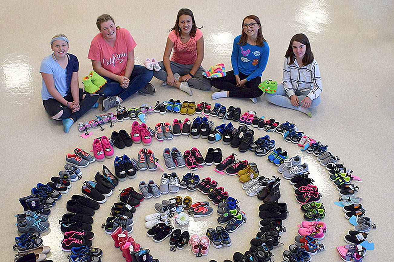 Girl scouts kick start shoe drive: Girl Scout Troop brings in 130 pairs for Clallam foster children