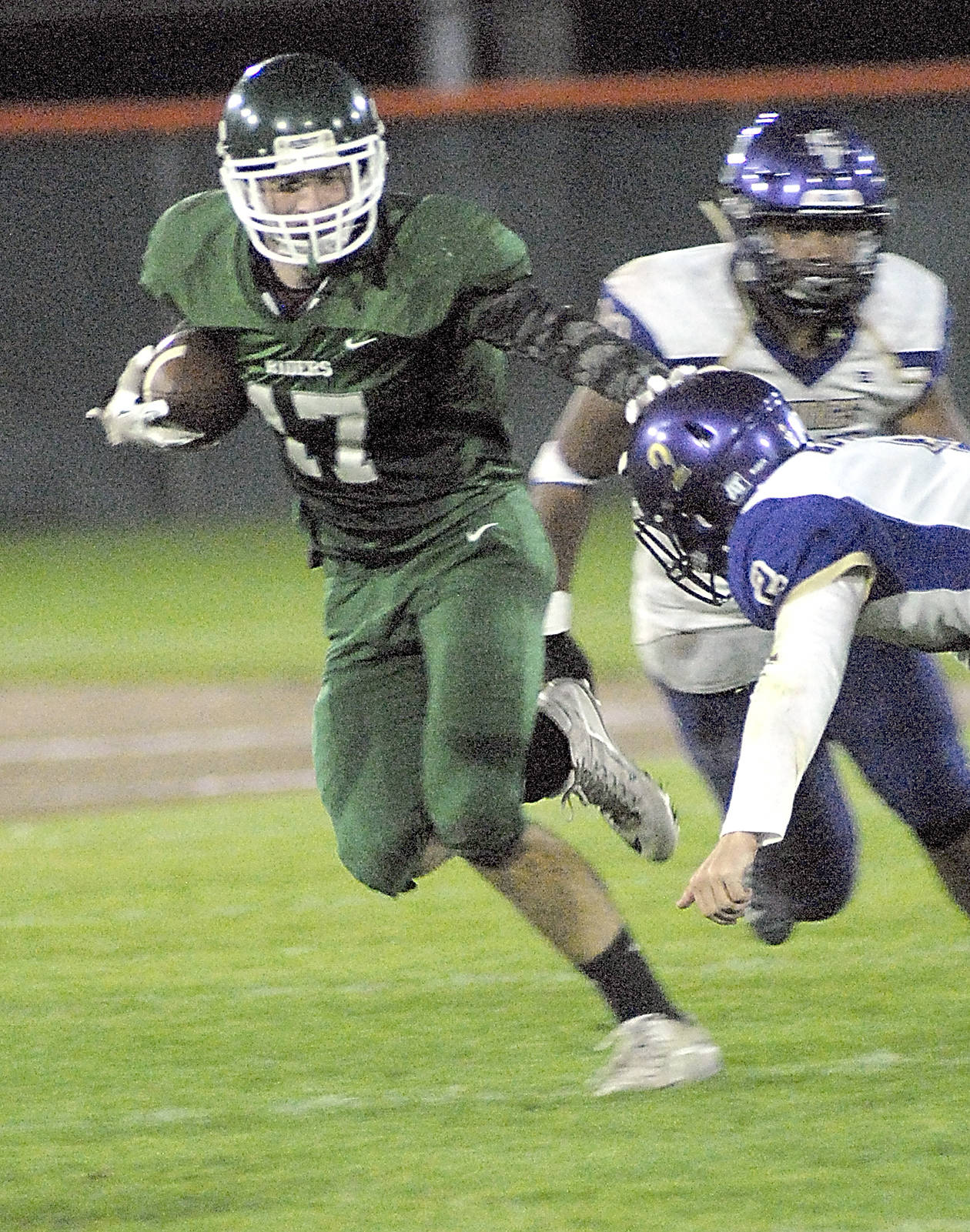 &lt;strong&gt;Keith Thorpe&lt;/strong&gt;/Peninsula Daily News                                Port Angeles’ Garrett Edwards, left, fends off the defense of North Kitsap’s Colton Bower during last week’s game at Civic Field.