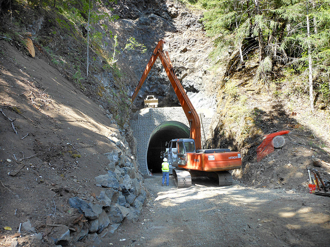 Work is shown on the the refurbished McFee Tunnel on the Spruce Railroad Trail. (Rich James/Clallam County)