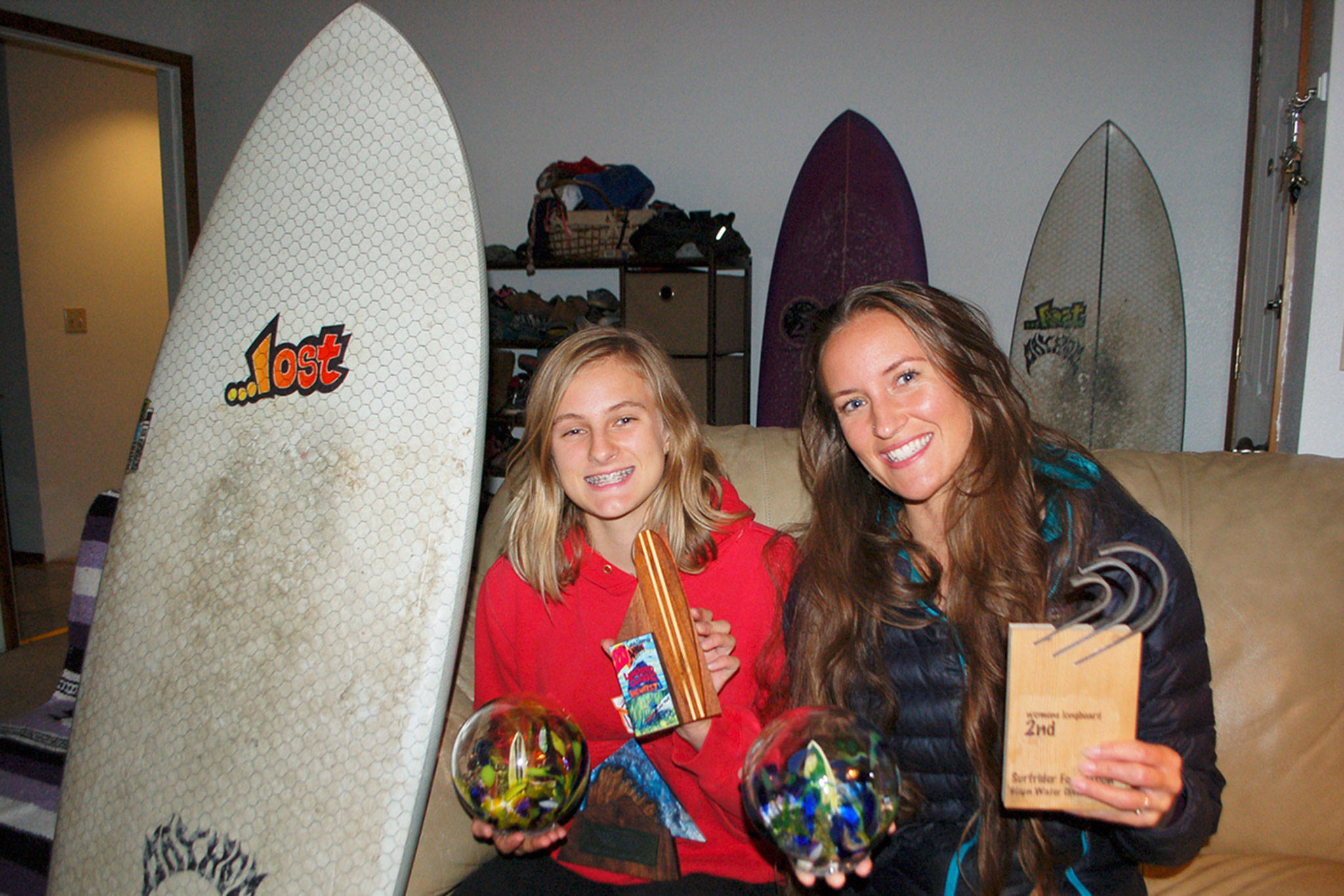 Gemma Davis, 16, left, followed in her mother Melissa Davis’ footsteps as a competitive surfer living in Sequim. Both mother and daughter share a passion for the sport and enjoy traveling to competitions up and down the West Coast. (Erin Hawkins/Olympic Peninsula News Group)
