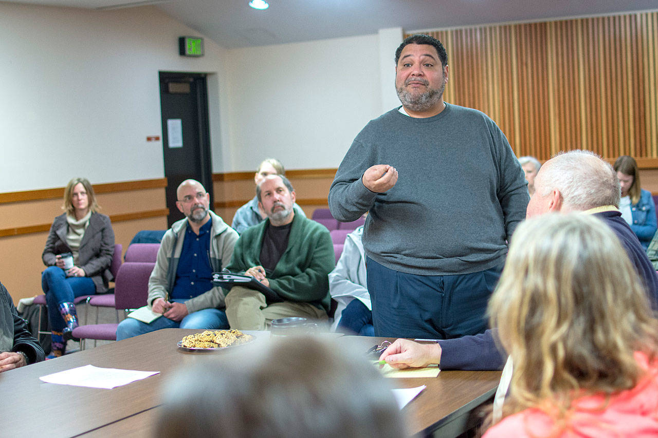 Serenity House of Clallam County’s shelter manager, Manny Aybar, speaks to the Clallam County commissioners during a Monday morning “commissioner’s conversation.” (Jesse Major/Peninsula Daily News)