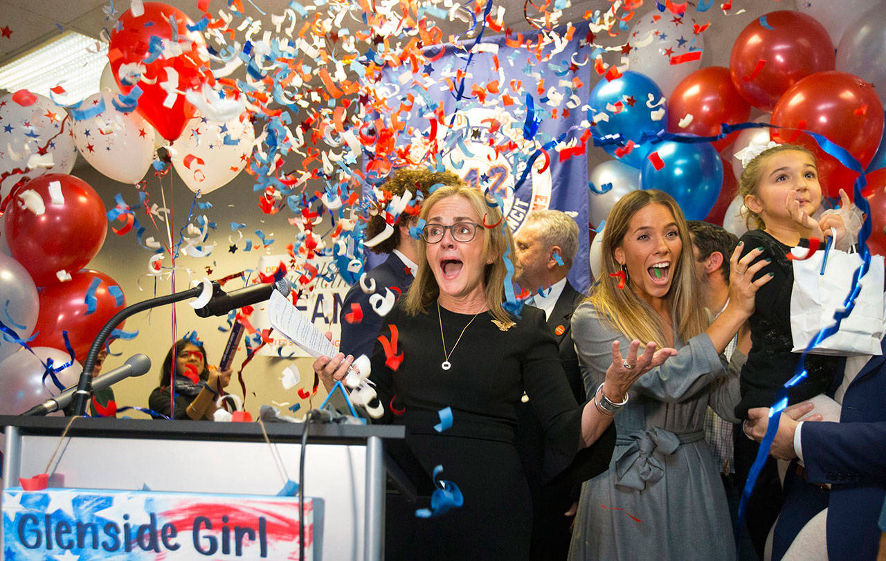 Democrat Madeleine Dean celebrates after winning Pennsylvania’s 4th Congressional District race in Fort Washington, Pa., on Tuesday. (Charles Fox/The Philadelphia Inquirer via AP)