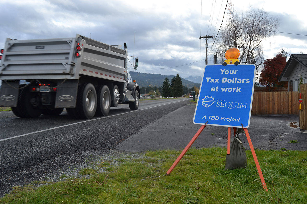 Residents voted to continue the Transportation Benefit District tax through 2029 to fund such projects as this chip-sealing earlier this year on River Road. (Matthew Nash/Olympic Peninsula News Group)