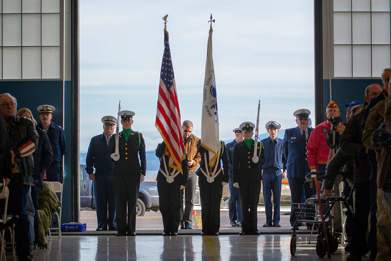The Port Angeles High School Naval Junior Reserve Officers Training Corps Color Guard during the presentation of the colors at the Veterans Day ceremony at U.S. Coast Guard Air Station/Sector Field Office on Sunday. (Jesse Major/Peninsula Daily News)