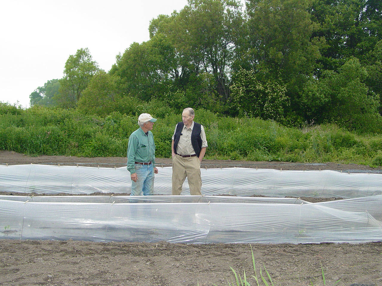 Harry Lydiard and Nash Huber discuss the importance of agricultural open space. (North Olympic Land Trust)