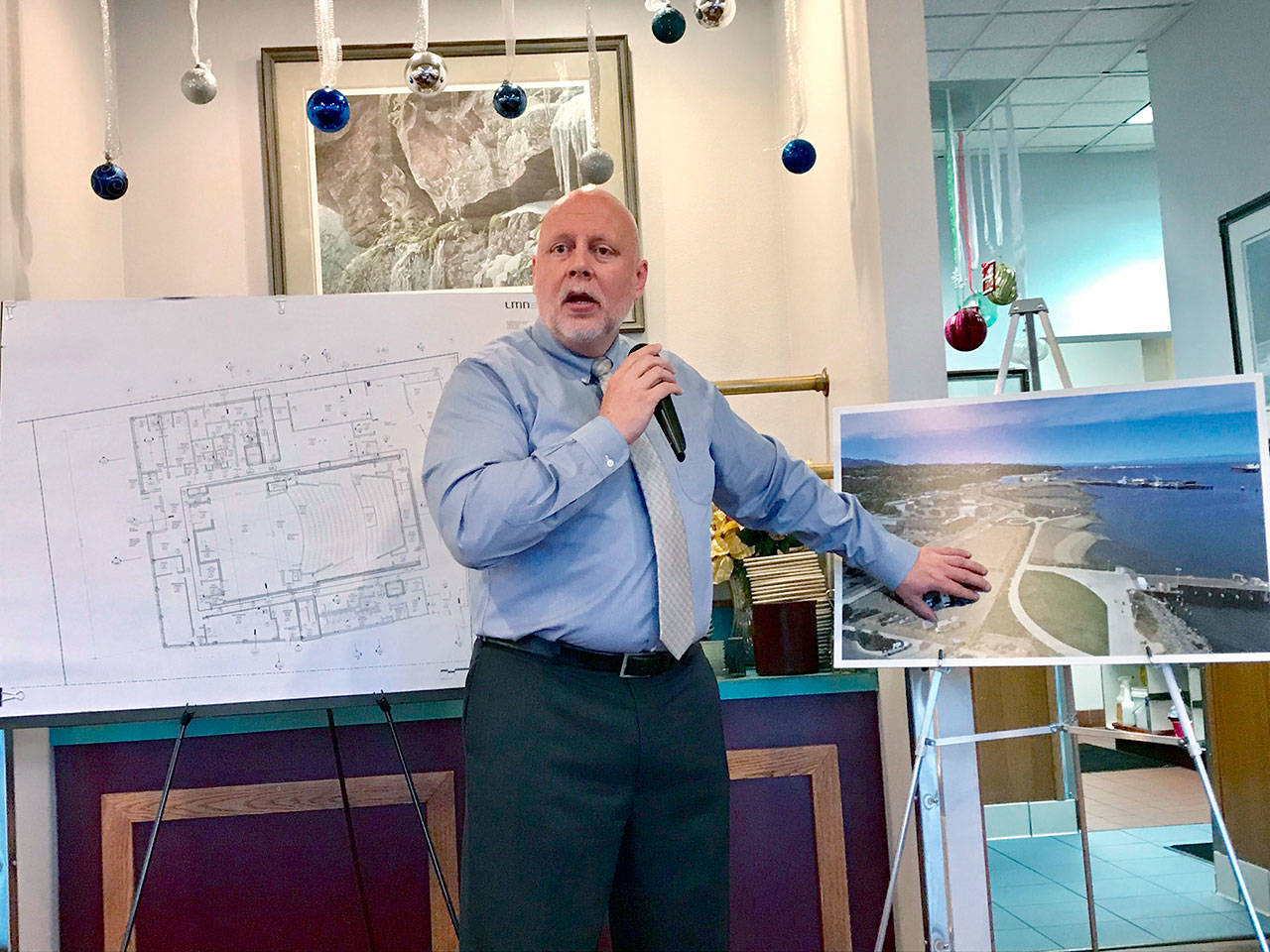 Chris Fidler, executive director of the Port Angeles Waterfront Center, told a business group Tuesday that construction of the center is on track to begin in August 2019. (Paul Gottlieb/Peninsula Daily News)