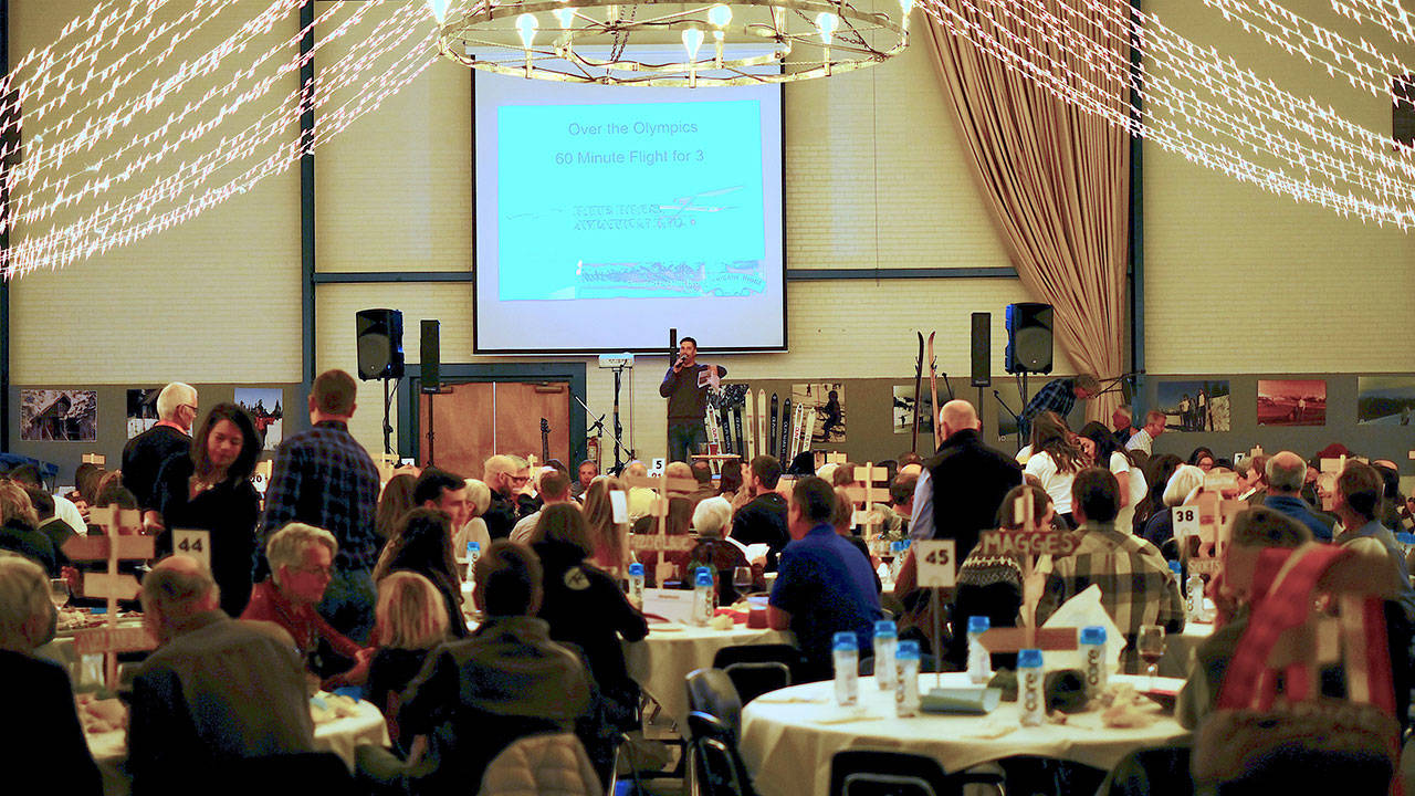 Casey Northern auctions off the first package of the live auction at the 21st annual Winterfest fundraiser in mid-November.