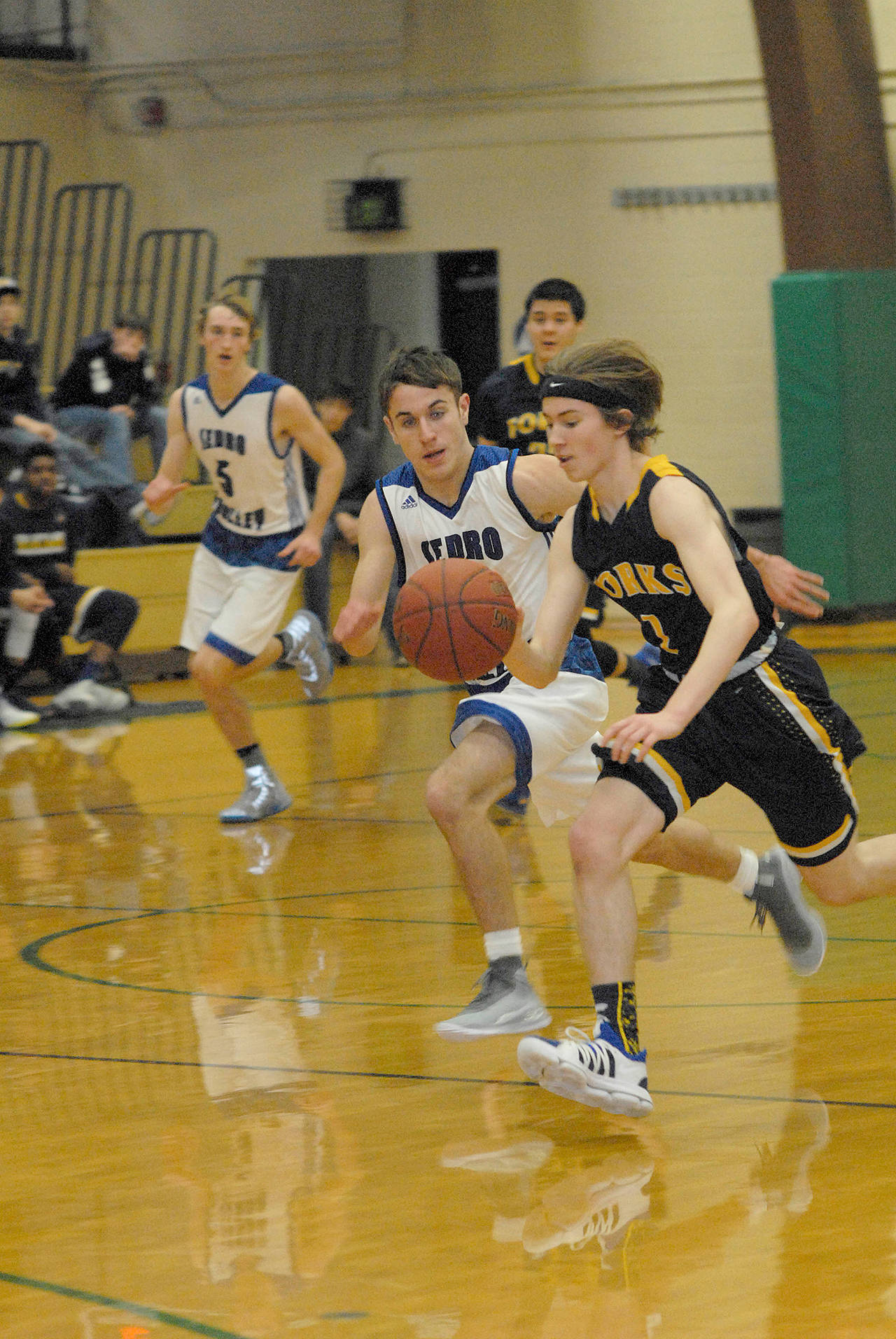 Keith Thorpe/Peninsula Daily News Forks Seth Johnson, right, was an All-Evergreen League first-team selection last season.