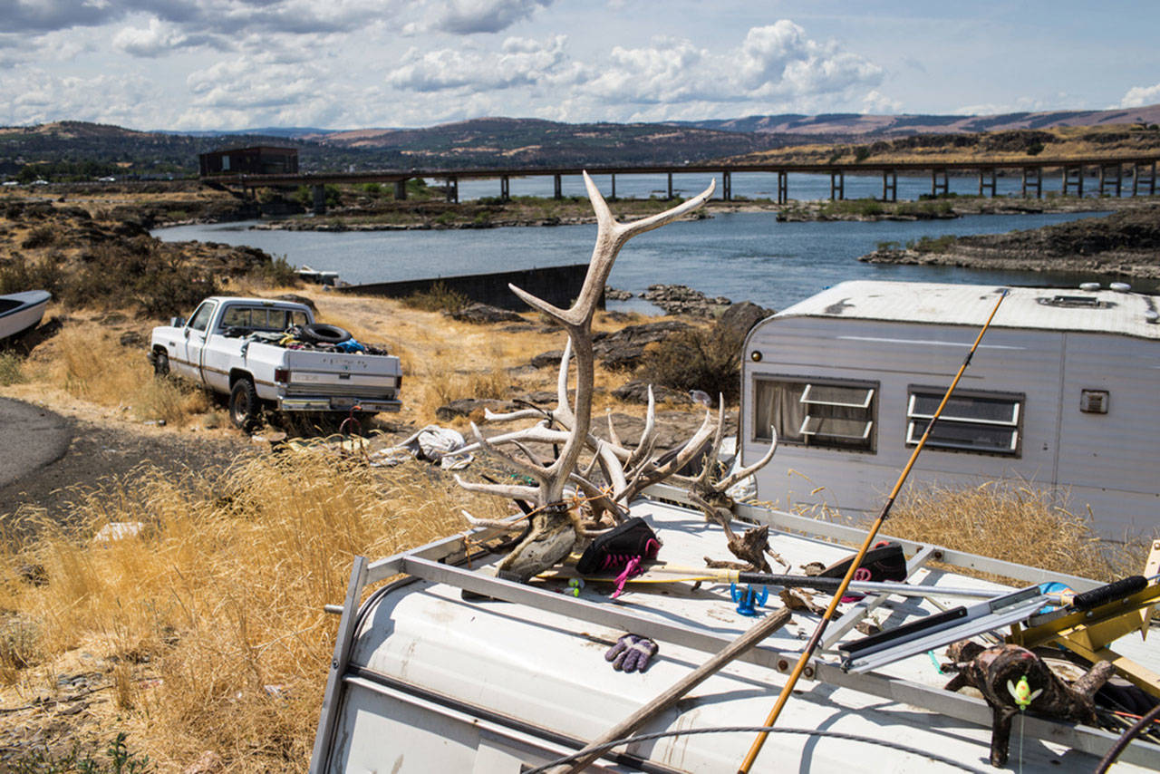 Lone Pine, at the base of The Dalles Dam, is filled with the ramshackle housing of tribal members who make their living along the Columbia River. Many lived there before the dam was built. (Thomas Boyd/The Oregonian/OregonLive)