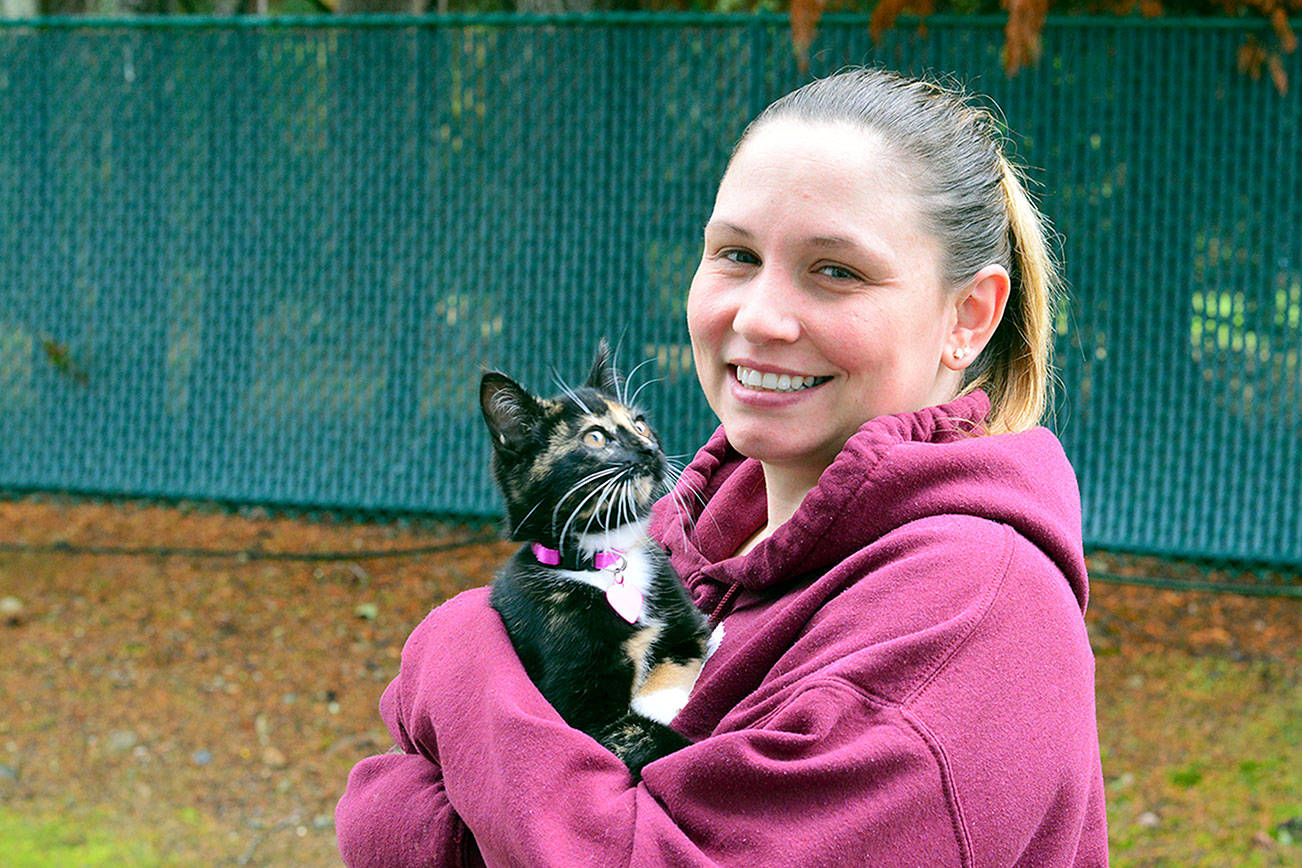 Trina Sloan recently adopted a kitten for her little boy — and for herself.                                (Diane Urbani de la Paz/for Peninsula Daily News)