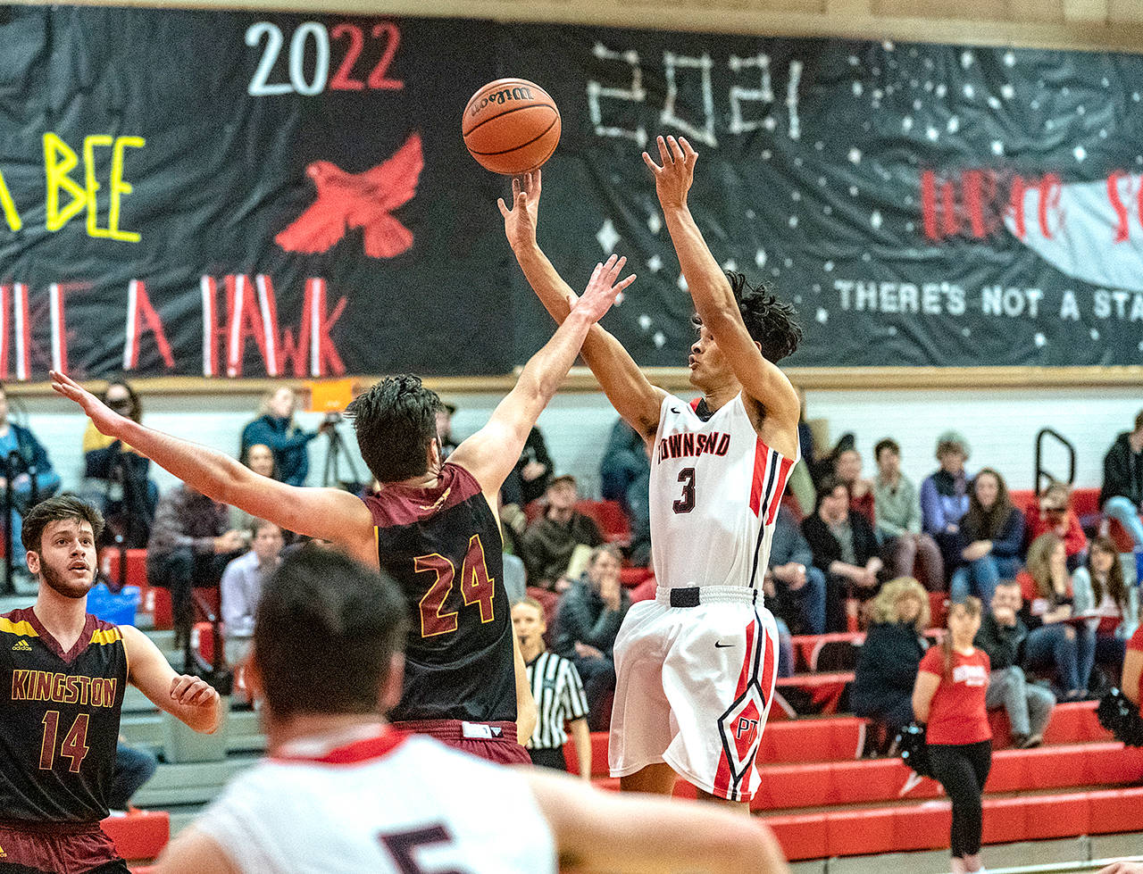 Steve Mullensky/for Peninsula Daily News Port Townsend’s Kavi Baabahar knocked down this jumper over Kingston’s Jack Hermanson during a game last week.