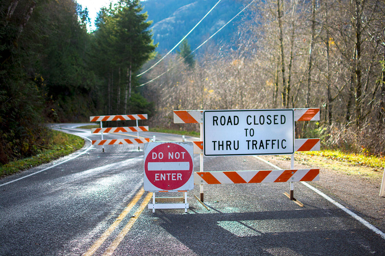 Olympic Hot Springs Road is closed to traffic after heavy rain caused the bank near the parking lot at Madison Falls to erode. Olympic National Park is asking the public to comment on its proposals to restore long-term access to the Elwha Valley. (Jesse Major/Peninsula Daily News)