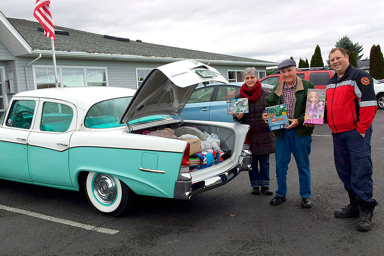 PHOTO: Sequim Valley Car Club donates to toy drive