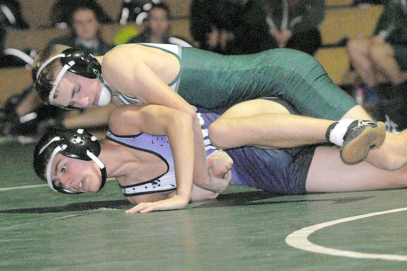 PREP SPORTS ROUNDUP: Port Angeles wrestlers open with two huge dual-meet wins; Roughrider swimmers splash Klahowya
