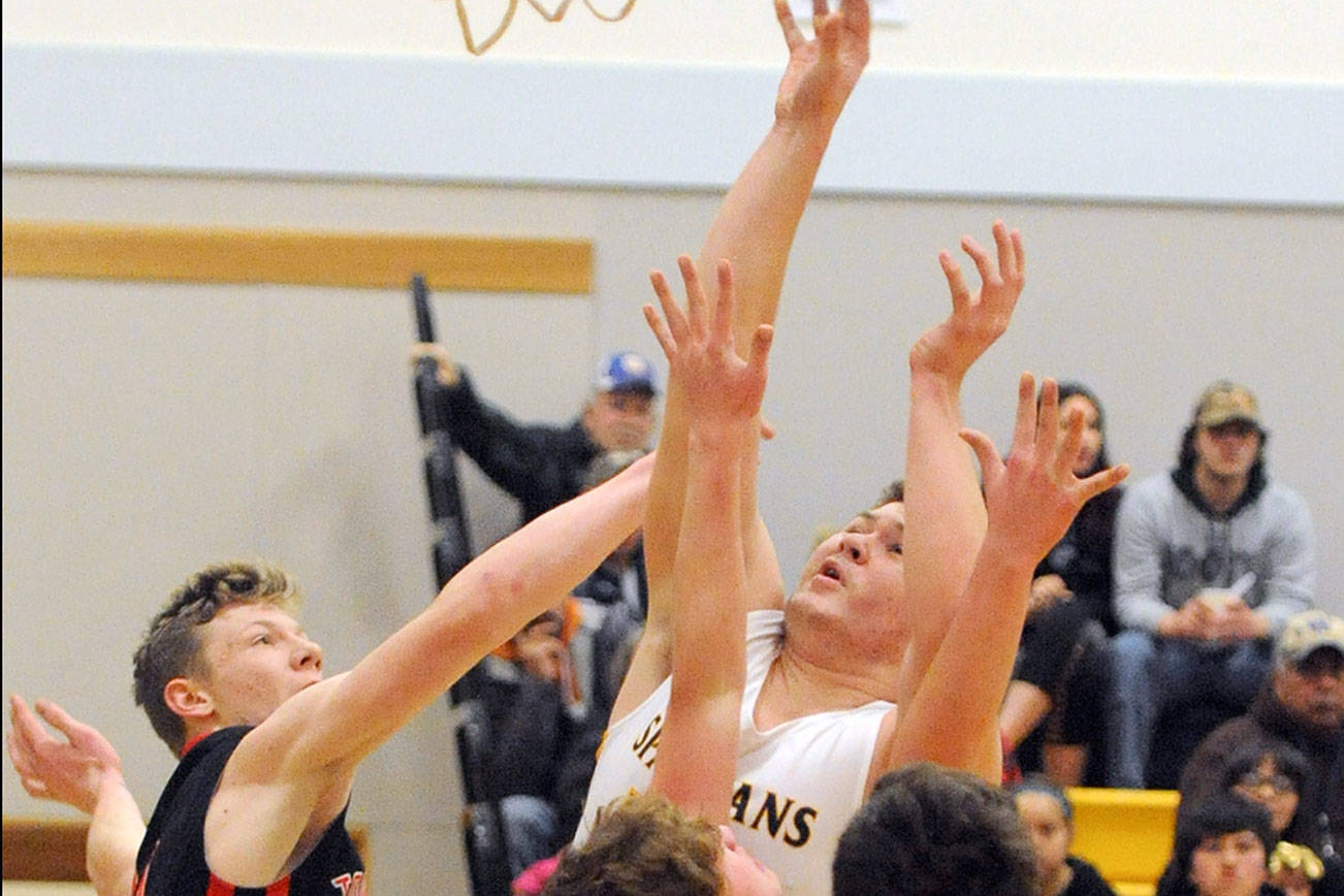 BOYS BASKETBALL: Forks sizzles inside and out in dusting Port Townsend 60-42